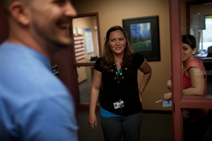 Intensive Outpatient Program counselor Lisa Champ talks with her patient Doug Starcher as fellow counselor Angel Murray looks on at the SEPTA Correctional Facility in Nelsonville, Ohio. The IOP is a mix of behavior and life skills classes meant to help inmates deal with their addiction and prepare for life after incarceration.