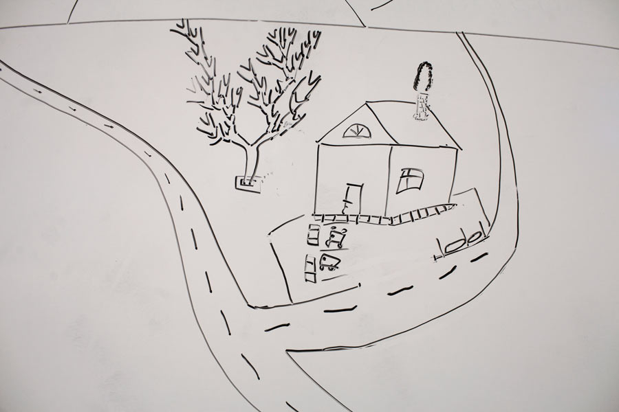 A drawing of an idealized home remains on a whiteboard in a classroom at SEPTA. The key difference between this facility and other prisons is that residents are  required to participate in programs such as drug counseling, anger  management and GED classes if they do not have their diplomas.