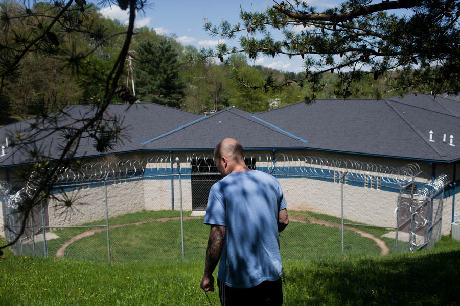 Doug Starcher walks the grounds outside the fence at the SEPTA Correctional Facility in late April. He hopes he is done with prison life, and never returns. "I don't have another one in me," he says. Starcher was released from SEPTA on May 15, 2011.
